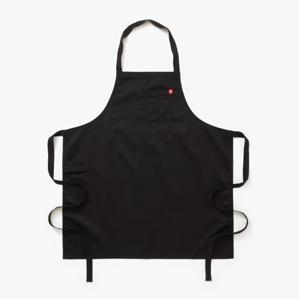 Built on our classic apron silhouette, the Restaurant Apron is paired back for simplicity. The Restaurant Apron is crafted with durable Poly Cotton fabric, and features 100% cotton webbing waist straps, neck strap, and towel loop.