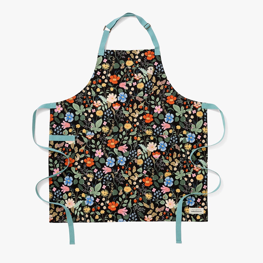 https://industry.hedleyandbennett.com/cdn/shop/products/Rifle-Paper-Co-Strawberry-Fields-Apron-1.jpg?v=1665159053